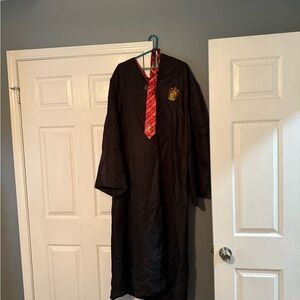 Harry Potter robe, tie and lenseness glasses. Wore once EUC